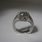 14kw Diamond Engagement Ring with round and baguette Diamonds